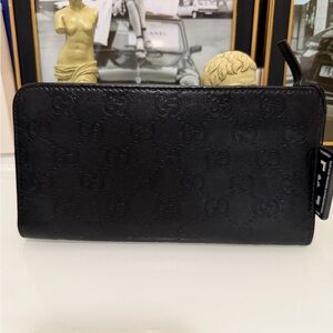 Authentic Gucci Guccissima Zip Around long leather wallet Black with COA .